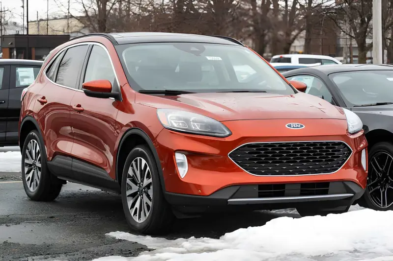 2020 Ford Escape Hybrid exterior side profile in a dealership lot