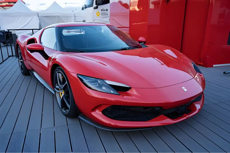 Ferrari 296 GTB plug-in hybrid supercar in red, side profile view showing mid-engine proportions